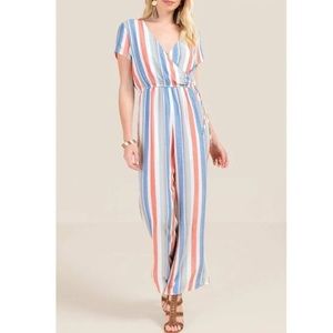 Francesca’s NWT Kora Blue Rain Jumpsuit